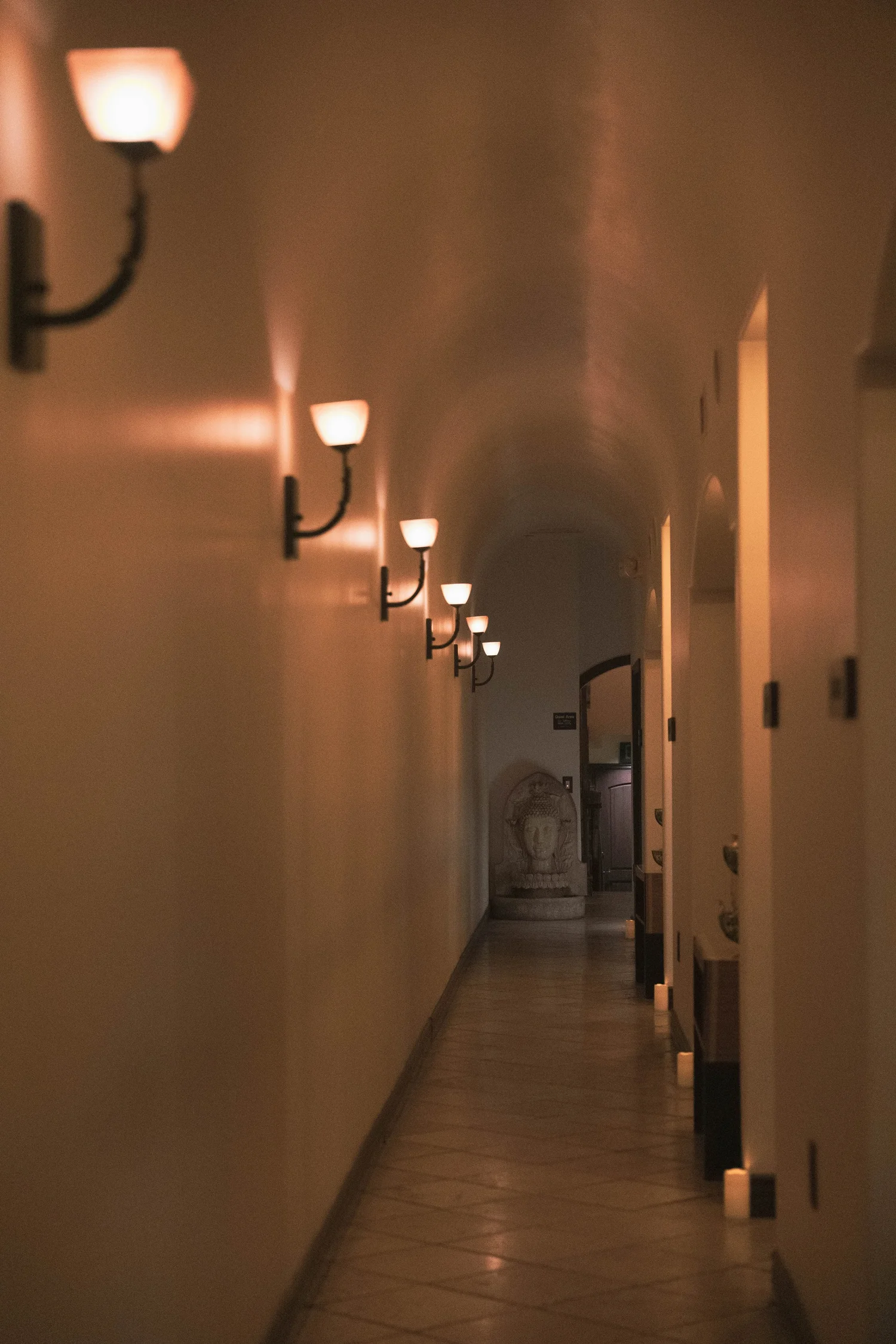 Warmly lit hallway inside rA Organic Spa
